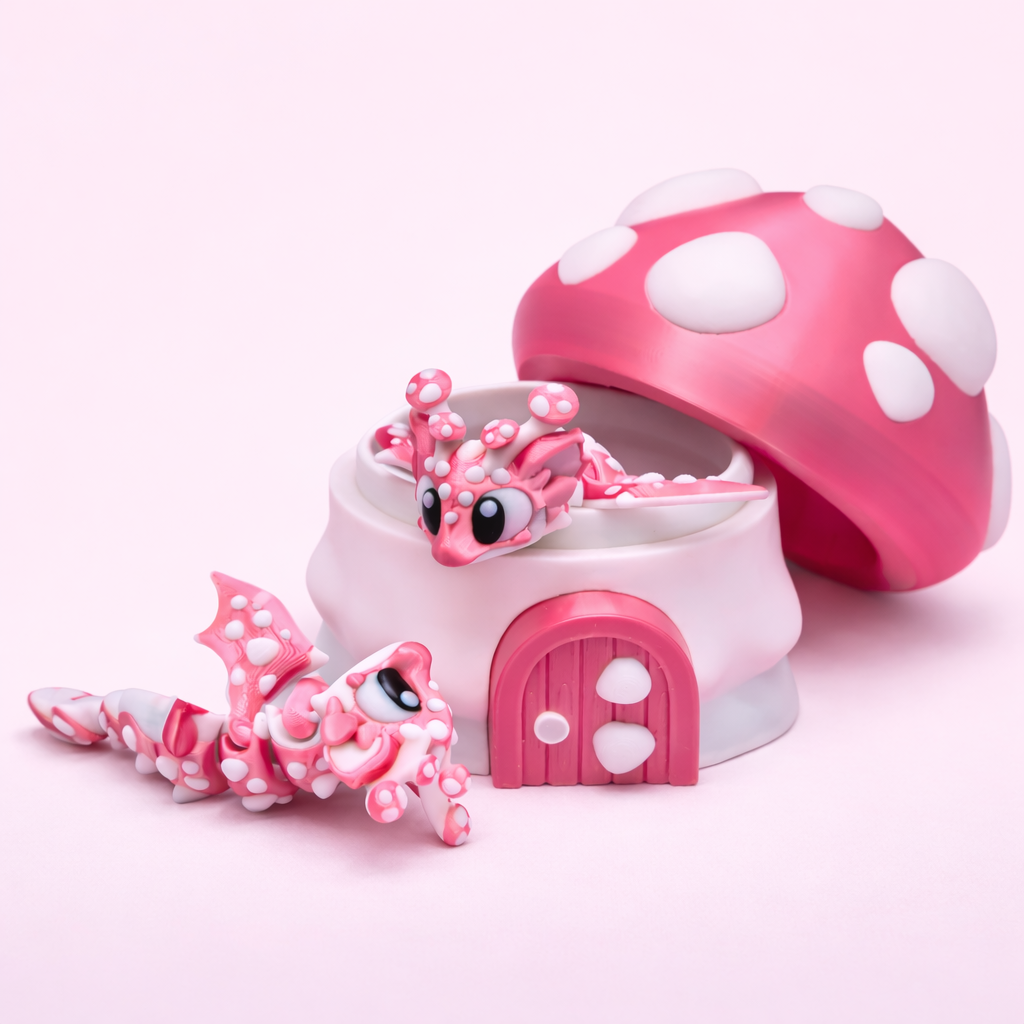 Pink toy with a mushroom-shaped container on a light pink background